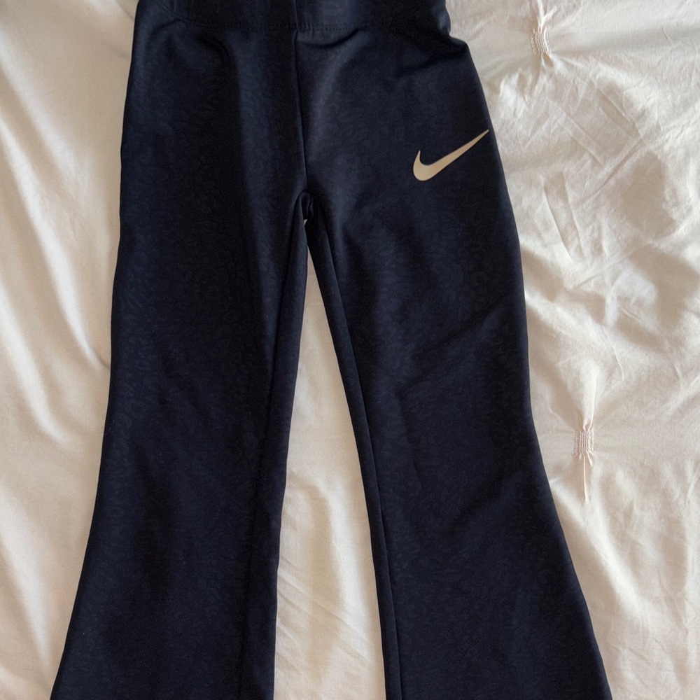 Nike Kids Black Joggers with Gold Logo